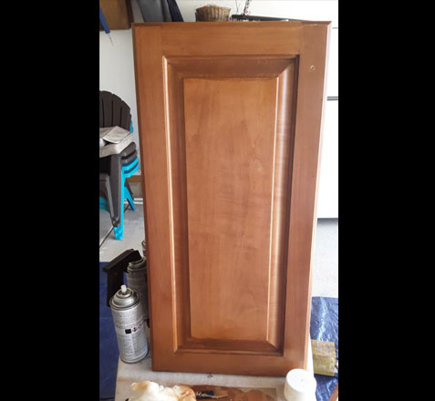 Refinished a water damaged kitchen cabinet